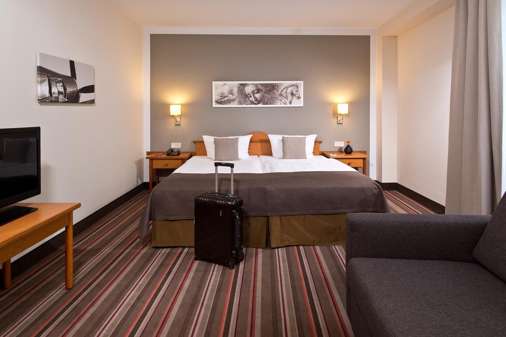 Leonardo Hotel Hamburg Airport Oda fotoğraf