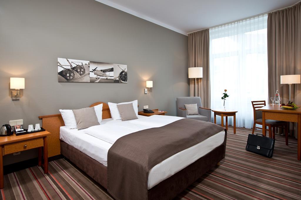 Leonardo Hotel Hamburg Airport Oda fotoğraf