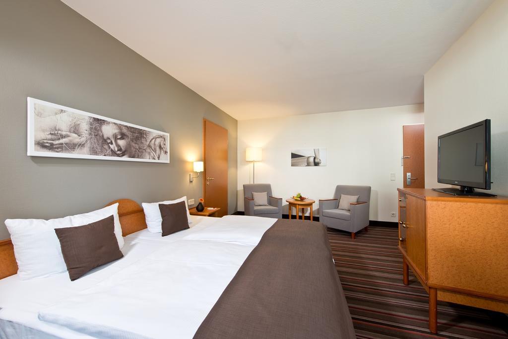 Leonardo Hotel Hamburg Airport Oda fotoğraf