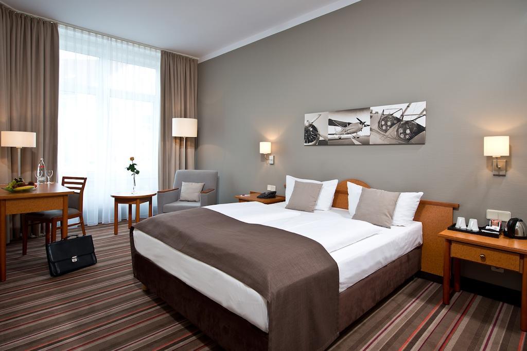 Leonardo Hotel Hamburg Airport Oda fotoğraf
